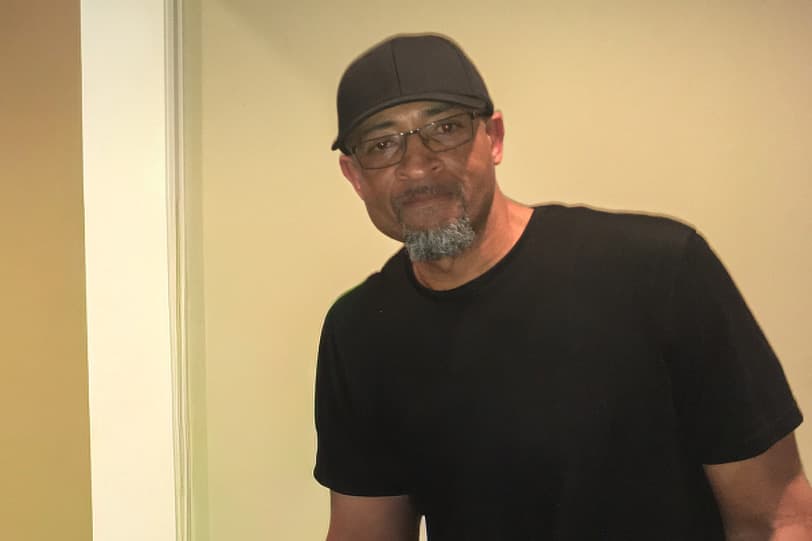 Reco Rowe — standing portrait